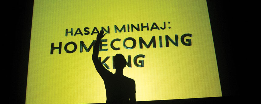 Hasan Minhaj onstage in "Homecoming King"