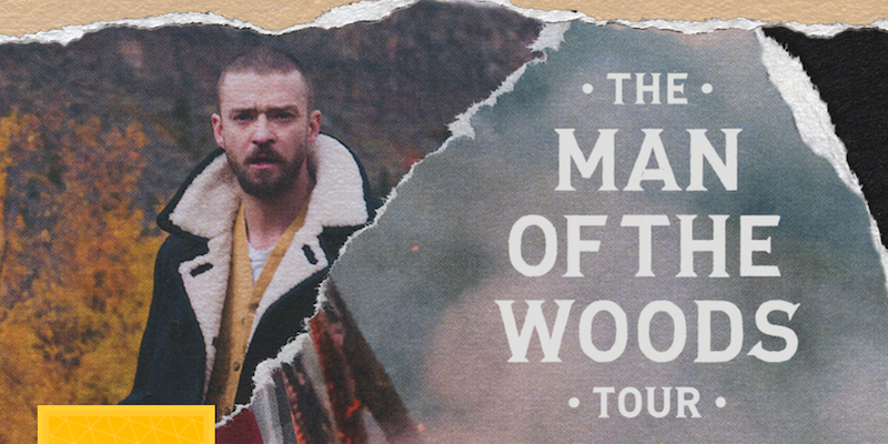 Promotional photo of Justin Timberlake standing in the woods.