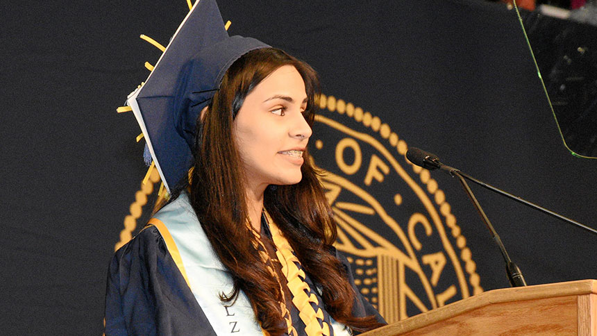 A female student speaks at commencement