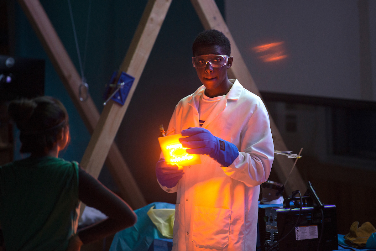 Students change the color of a light with low temperature liquid during the Material Magic Show at the UC Davis Picnic Day.